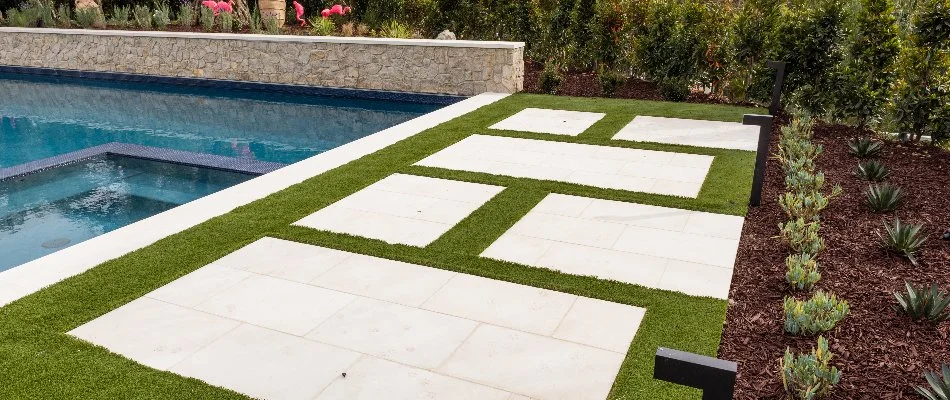 An outdoor living space in Encinitas, CA, with a patio.